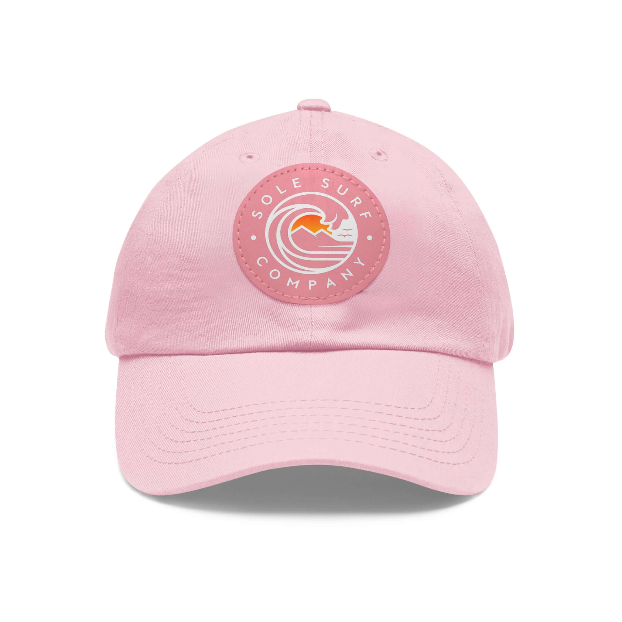 Mom Hat in pink with Sole Surf Company logo for trendy casual wear.