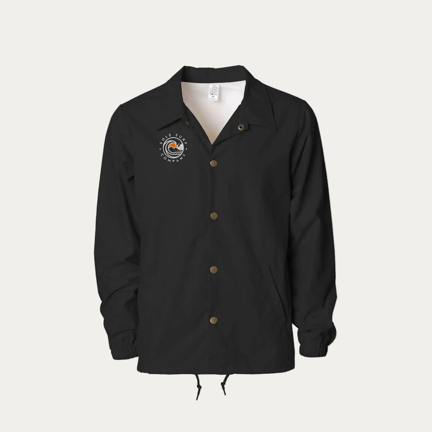 SSC Water Resistant Coaches Windbreaker displayed in black, featuring buttons and surf-inspired logo.