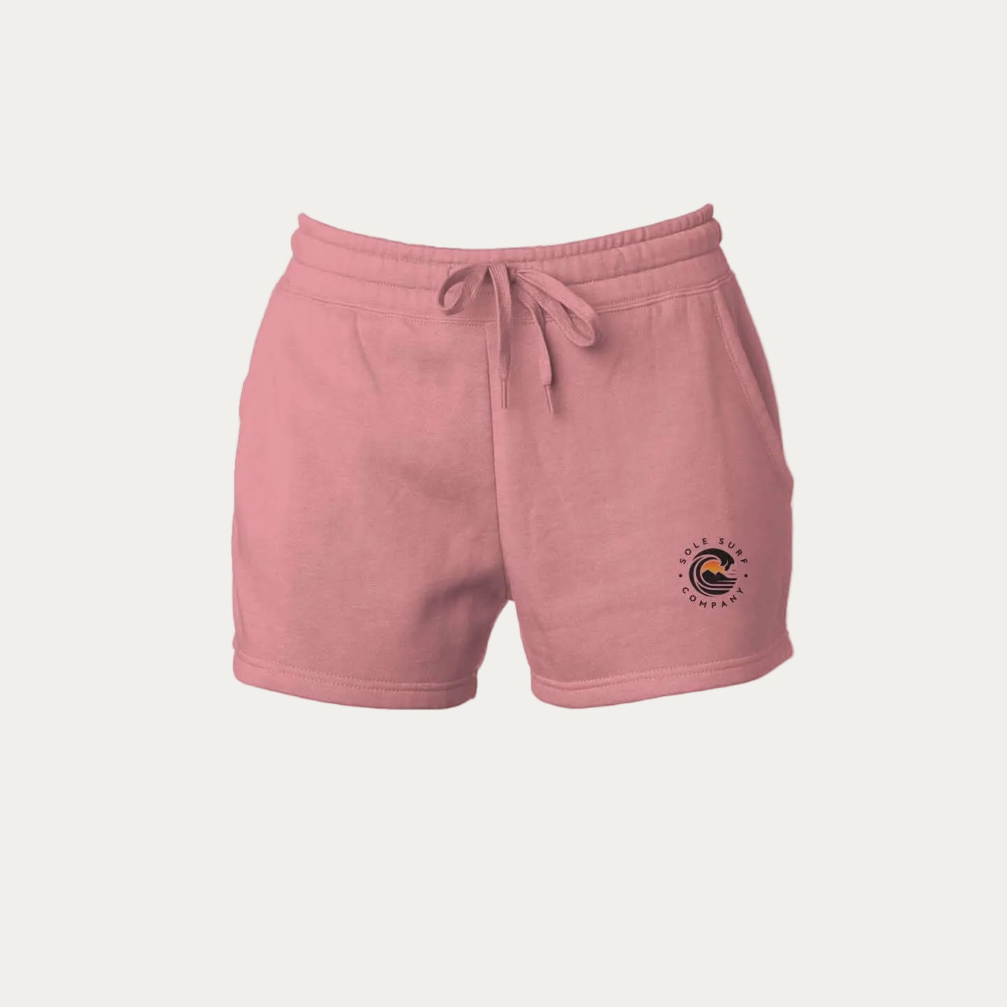 women's tide wash shorts in pink with wave logo, ideal for relaxed living and surfing adventures.
