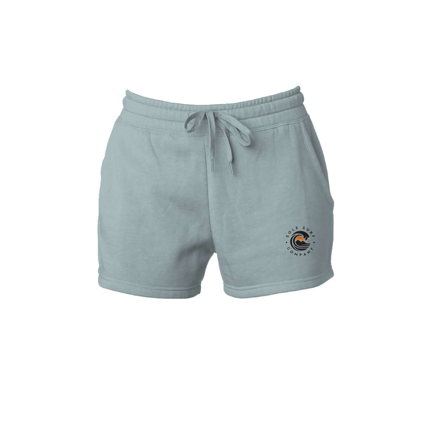 SSC Woman's TIDE wash short in soft blue with wave logo, perfect for summer adventures and casual outings.
