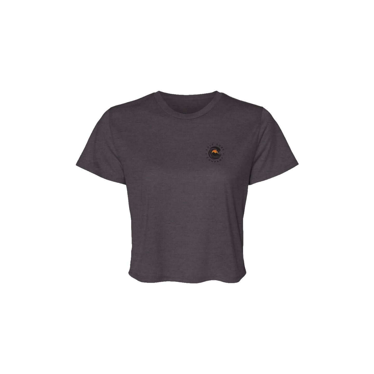 SSC Women’s Flowy Crop Tee – Island Woman in dark gray with logo on the front.