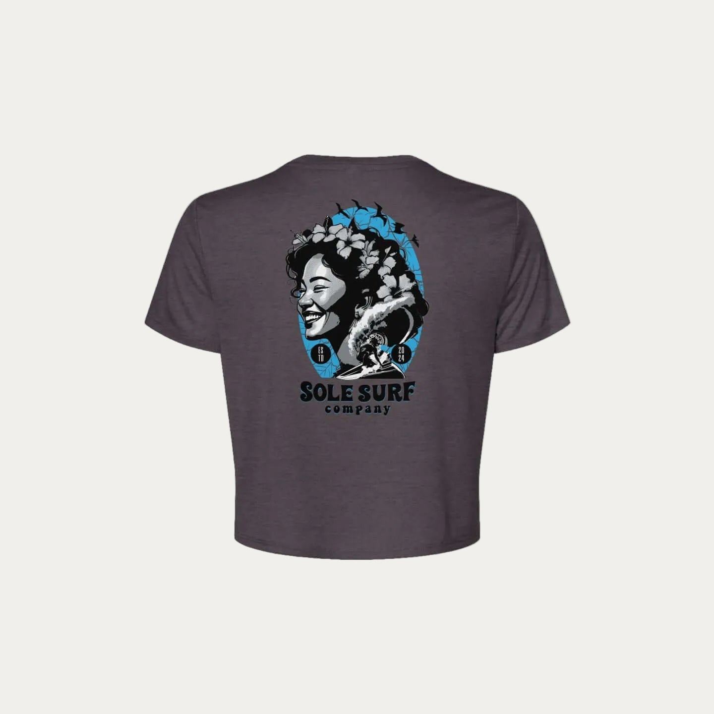 SSC Women’s Flowy Crop Tee – Island Woman featuring island-inspired illustration on the back.