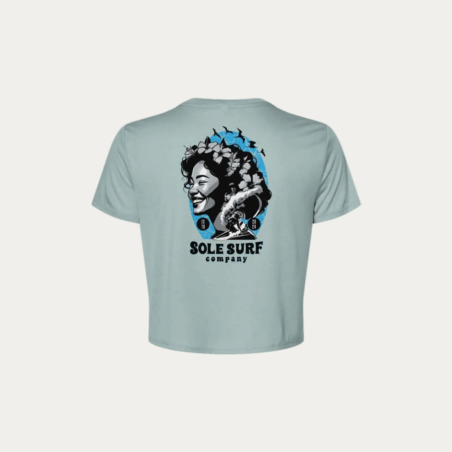 SSC Women’s Flowy Crop Tee – Island Woman back design featuring a smiling island woman illustration.