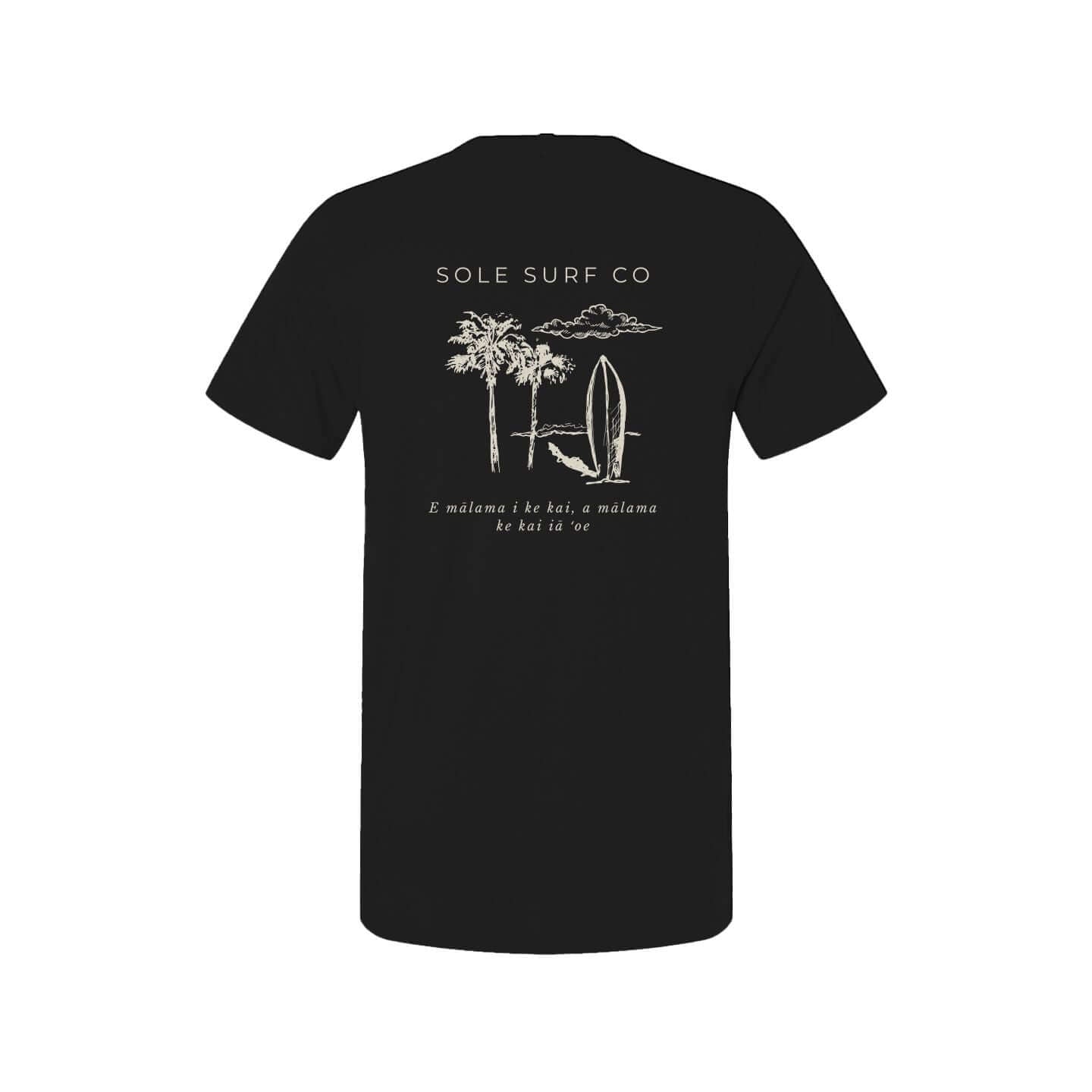 Mālama Tee by Sole Surf Co. featuring palm trees and surfboard design on a black shirt.