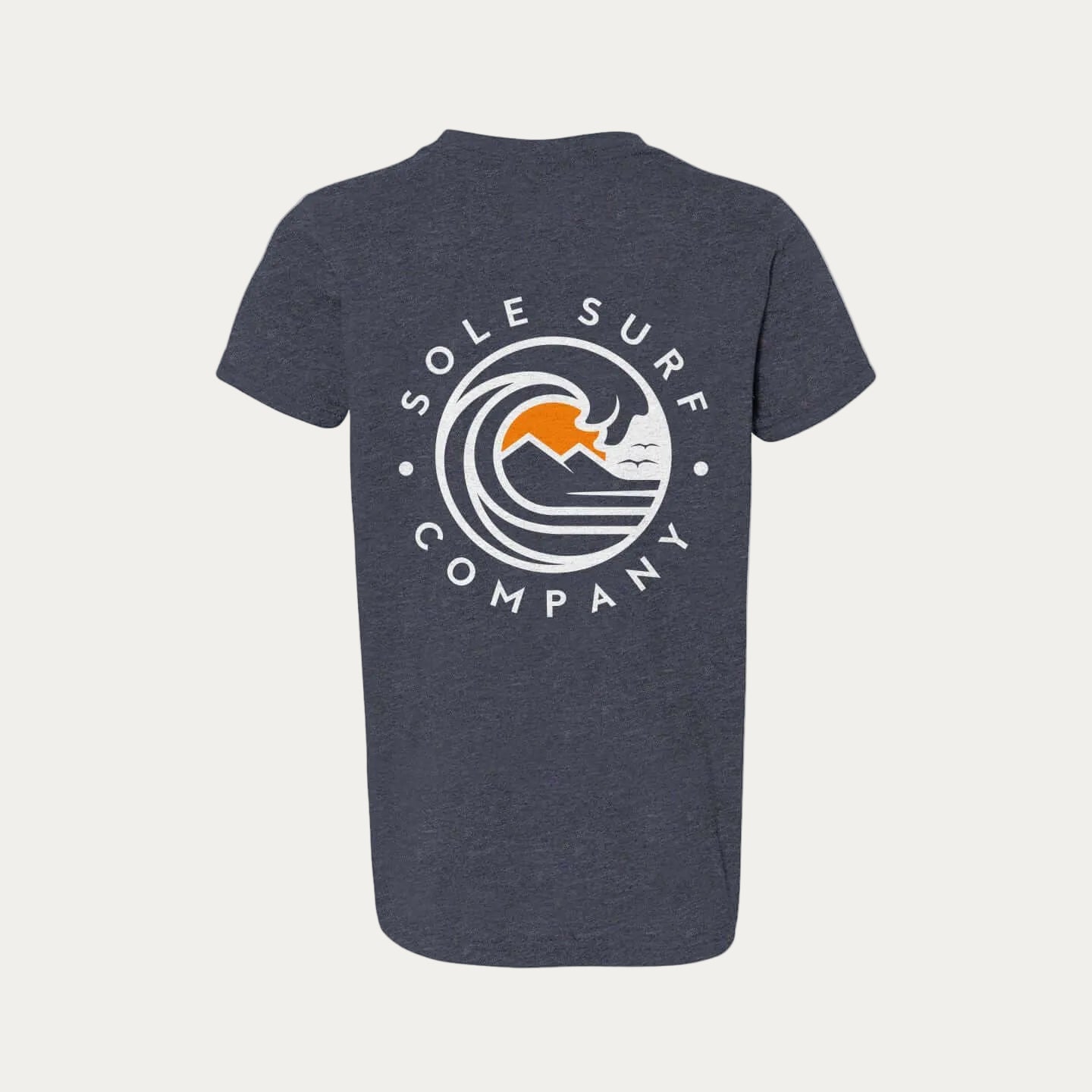 Kids Light Logo Tee featuring the Sole Surf Company emblem on a navy blue background.