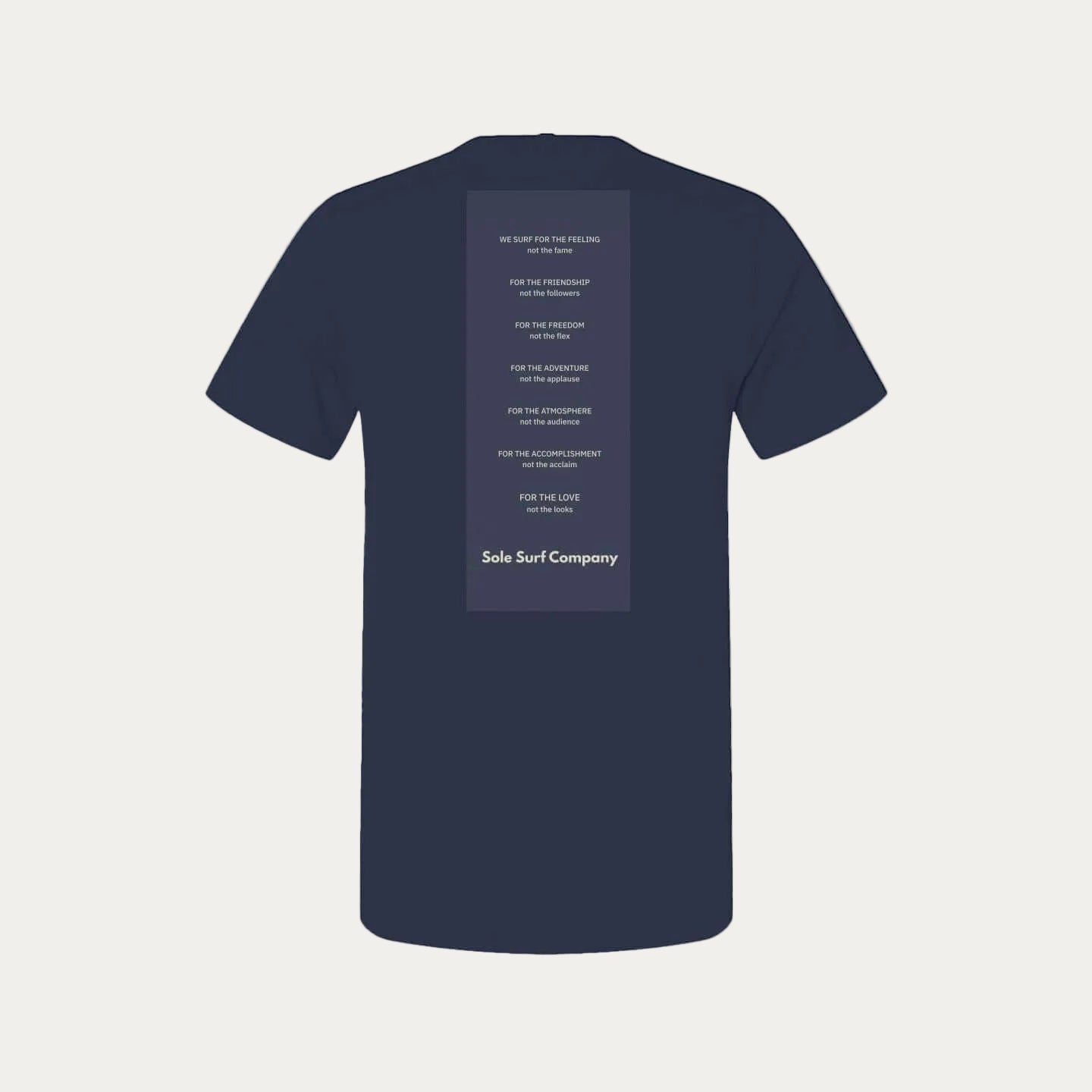 Sole Manifesto Tee showcasing surf values and clean typography on a premium navy shirt.