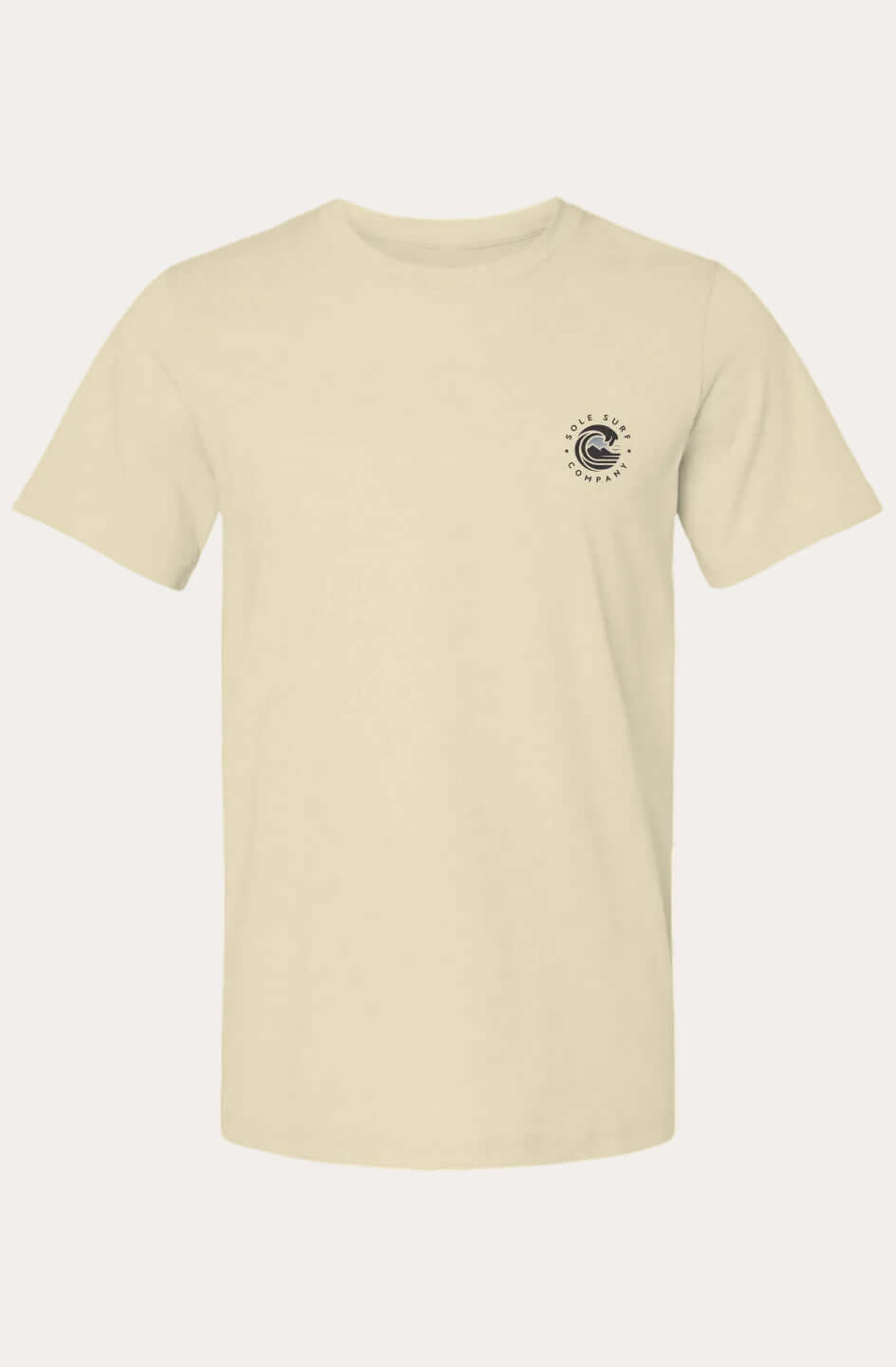 A light beige crewneck t-shirt with a small circular graphic printed on the left chest, displayed on a solid white background.
