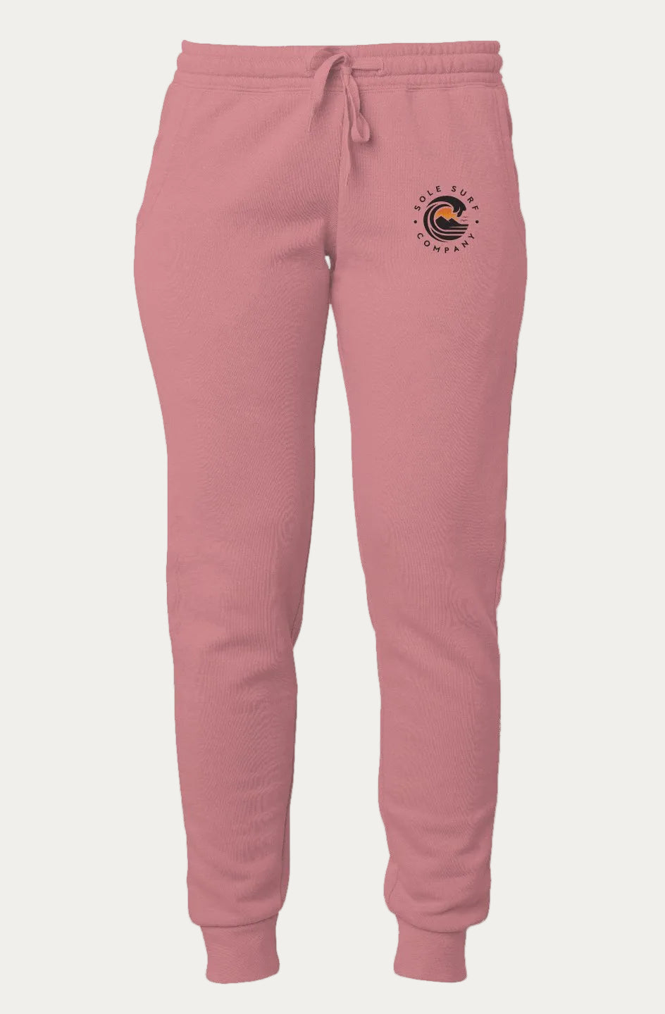 A pair of dusty rose pink sweatpants with a drawstring waist and a small circular logo on the upper left hip, shown against a plain white background. SCC Women's Orange Sun Sweatpants