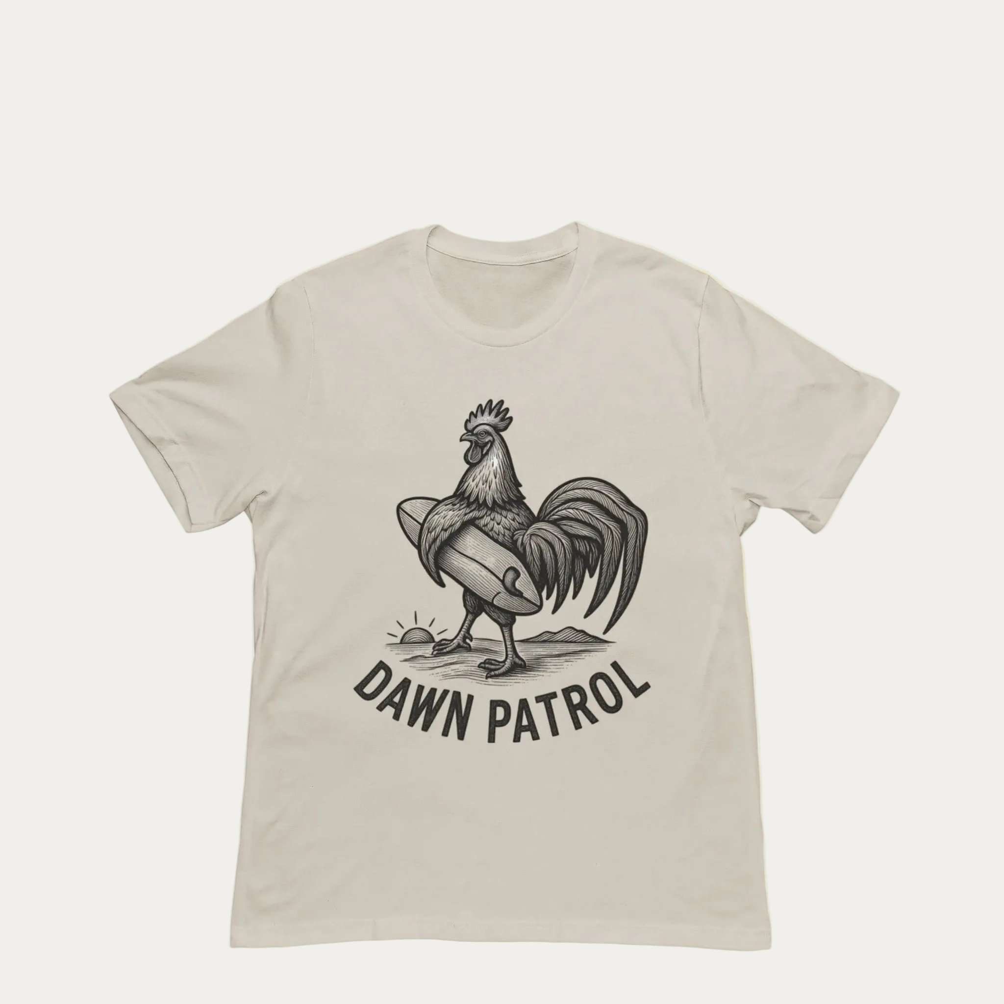 Natrual t-shirt with a rooster graphic and 'Dawn Patrol' text on a yellow background
