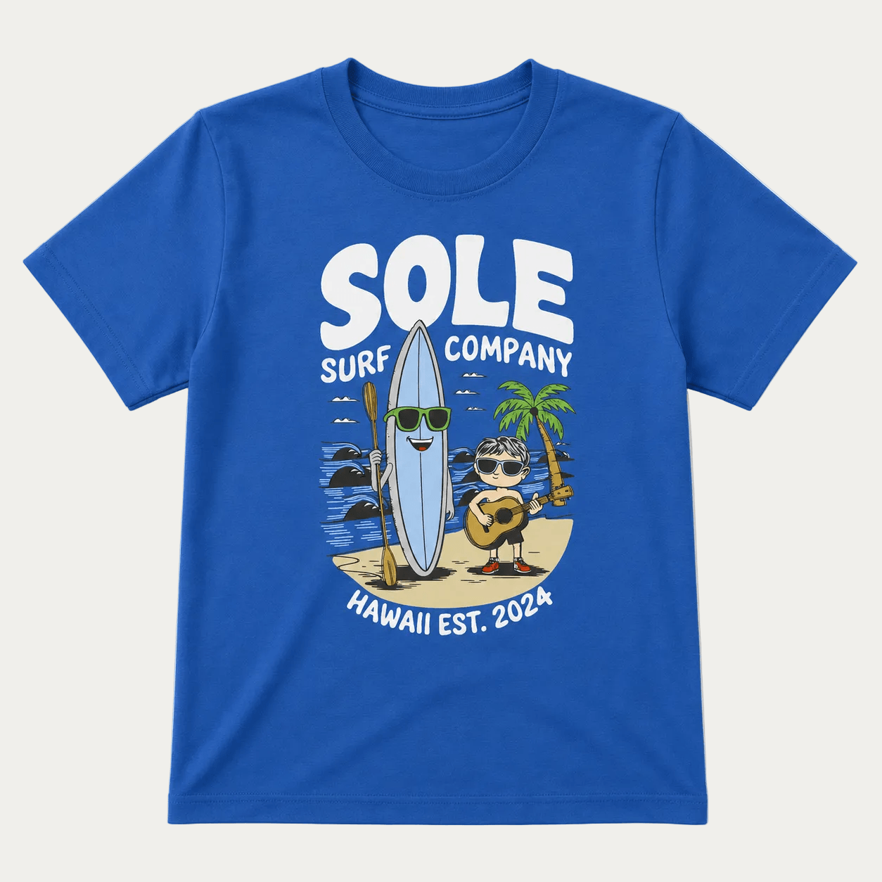 A royal blue short-sleeve crewneck t-shirt featuring a cartoon graphic of a surfboard character and a guitar player on a beach with the text 'SOLE SURF COMPANY' and 'HAWAII EST. 2024'.