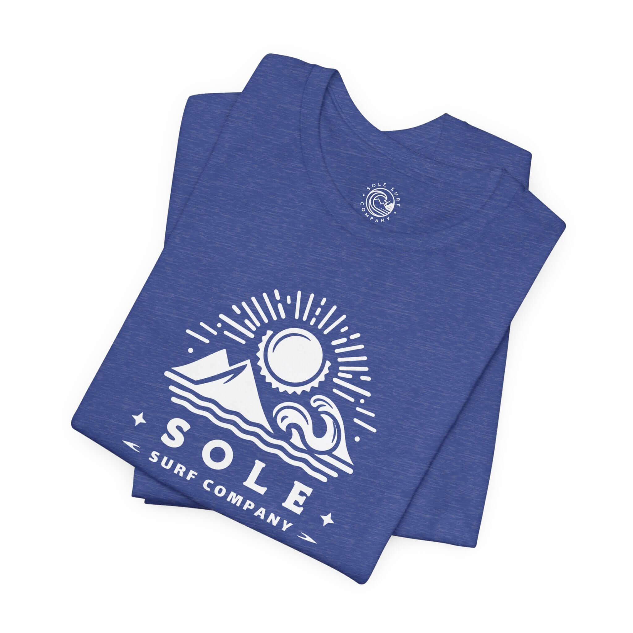 Blue t-shirt featuring Sole Surf Company logo with sun, mountain, and wave design, embodying island adventure spirit.