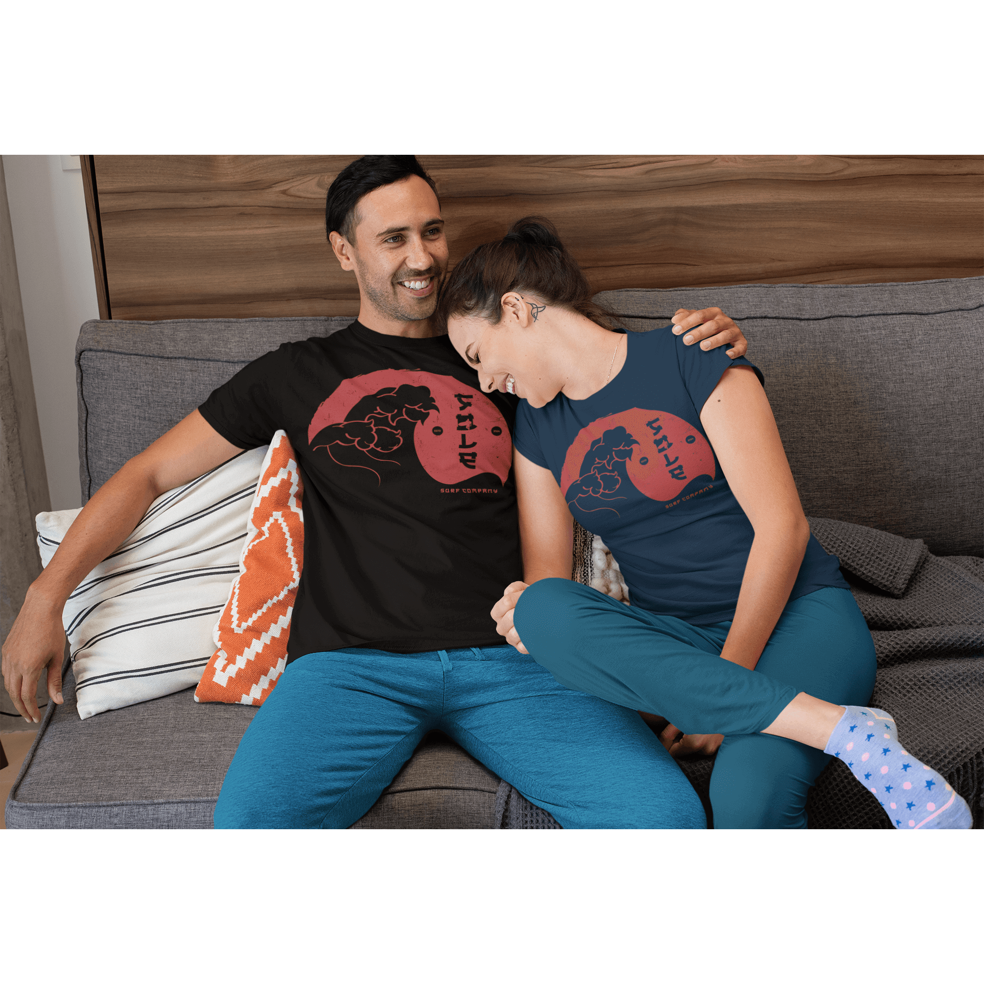 Serene Japanese Wave design T-shirts worn by a couple at home, embodying casual style and cultural appreciation.
